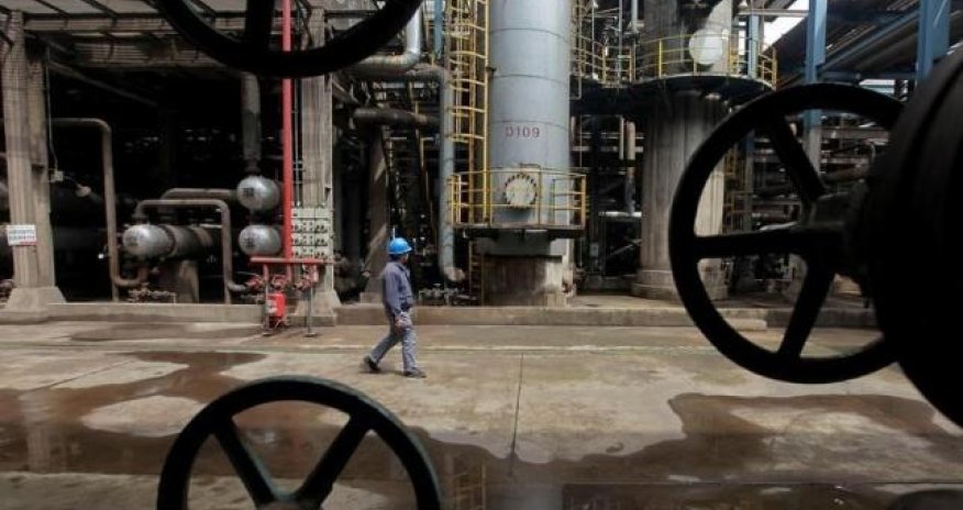 Oil stable as market seen in balance, but slow Asian demand hurts