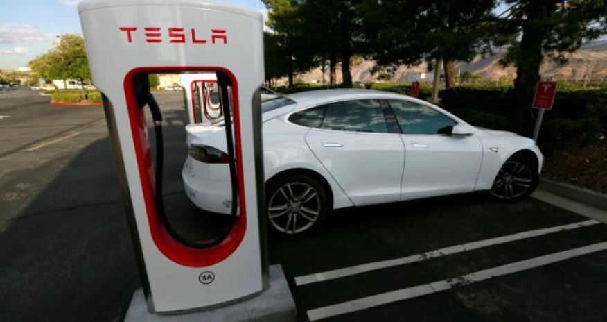 Tesla touts speed and driving range with new upgraded battery