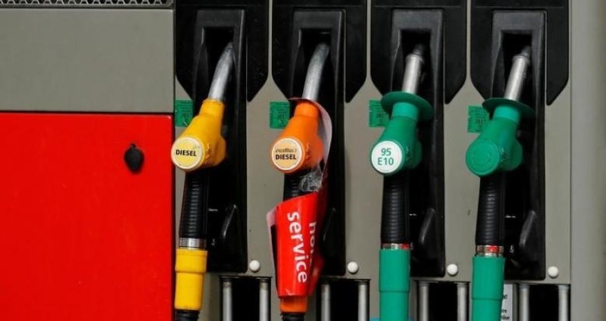 Oil prices rise as dollar comes off two-week high