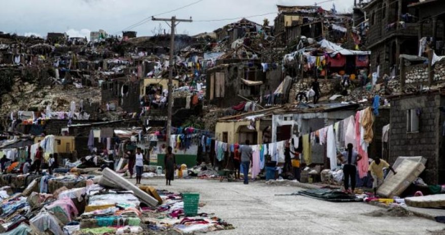 Hurricane Matthew toll in Haiti rises to 1,000, dead buried in mass graves