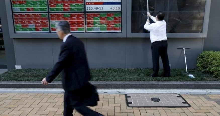 Asia shares extend losses, dollar off highs