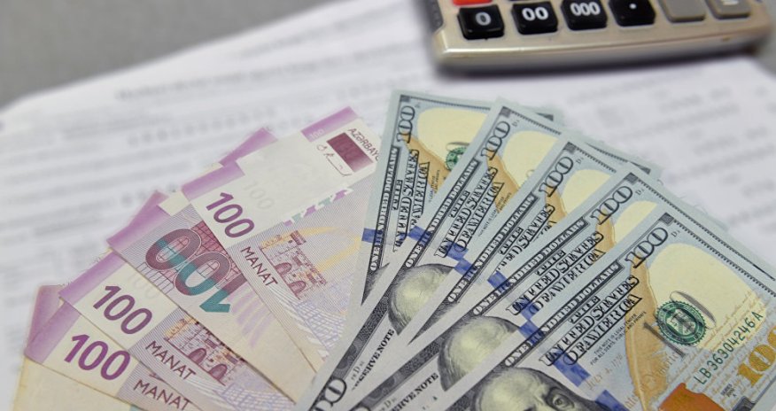Курс доллара приблизился к 1,71 маната