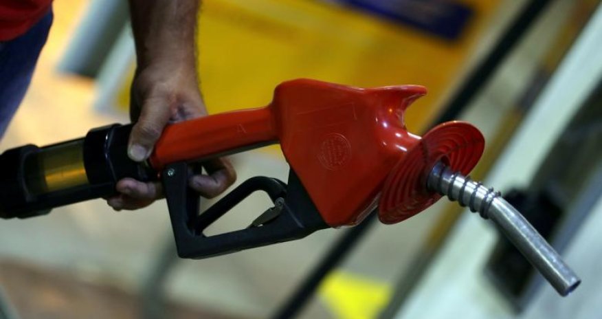 Oil prices fall over doubts of planned crude output cut