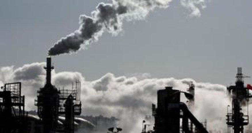 Oil prices edge up on expected U.S. crude inventory draw