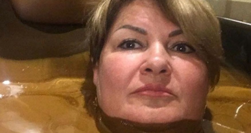Rus xanım məmurun Naftalandakı şəkili qalmaqala səbəb oldu - FOTO