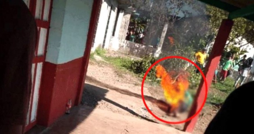 Qız uşağına təcavüz edib öldürən kişinin üstünə benzin töküb yandırdılar - FOTOLAR