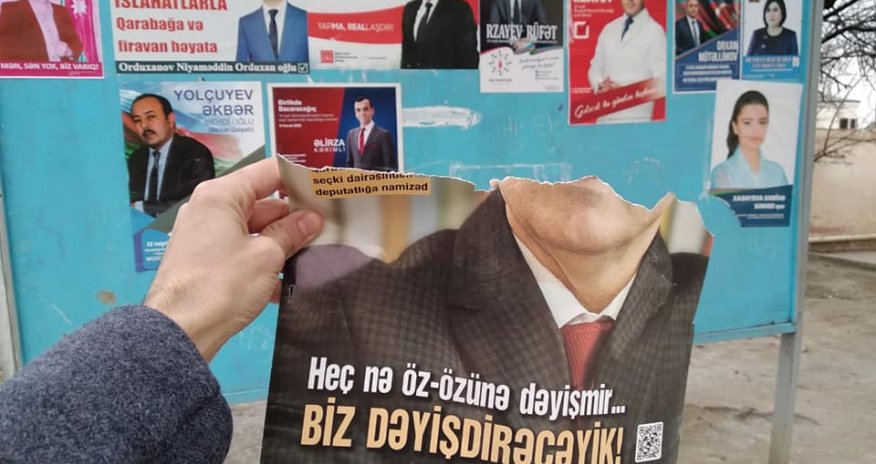 Namizədlərin plakatları qəsdən cırılır -  İDDİA  FOTO