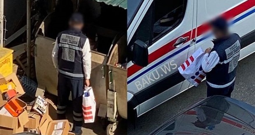 Bakıda təcili yardım maşınının sürücüsü zibil qutularını eşələyir -VİDEO