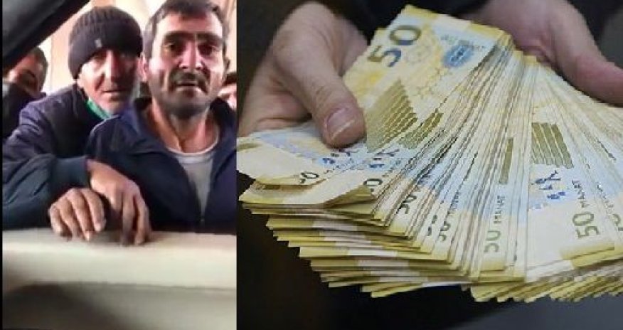 Bakıda naməlum şəxs insanlara pul paylayır - VİDEO 