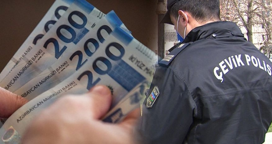 Polisə yaxınlaşıb  pul  istədi: Azərbaycanda  gizli  çəkilmiş  video  rekord  qırır