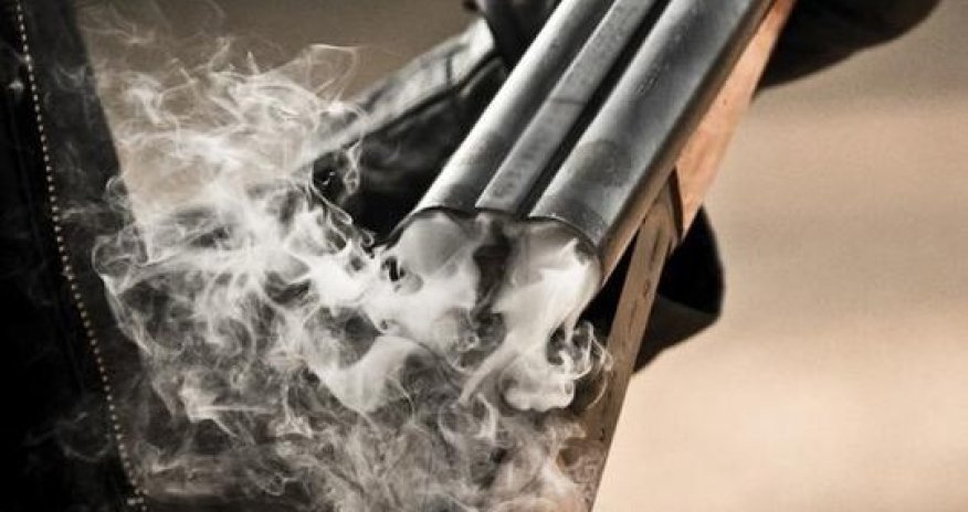 Silah mağazasında atışma - İki nəfər yaralandı-