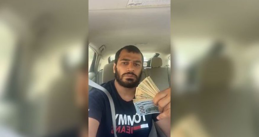 Məşhur azərbaycanlı cüdoçu bu dəfə dollarla özünü yellədi - VİDEO