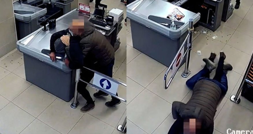 Polis əlində bıçaqla kassanı yarmaq istəyən şəxsi peşəkarlıqla zərərsizləşdirdi - VİDEO