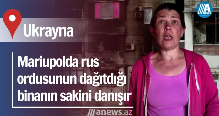 Mariupolda rus ordusunun dağıtdığı binanın sakini danışır