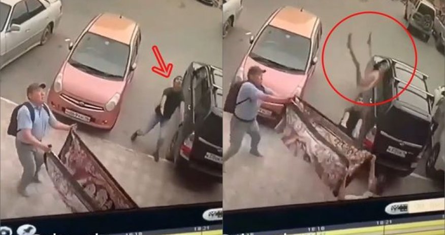 Yıxılan uşağı havada tutan kişinin qolları sındı - VİDEO