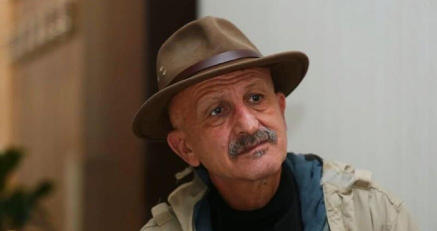 President Ilham Aliyev awards Reza Deghati