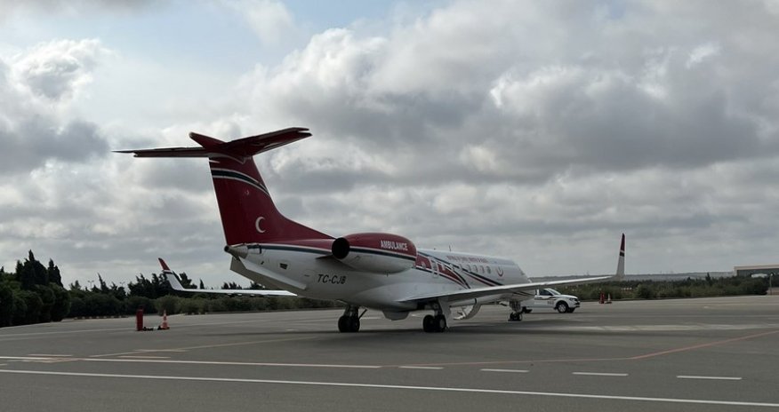 Binali Yildirim, Shamil Ayrim, and security guard seen off to Turkiye