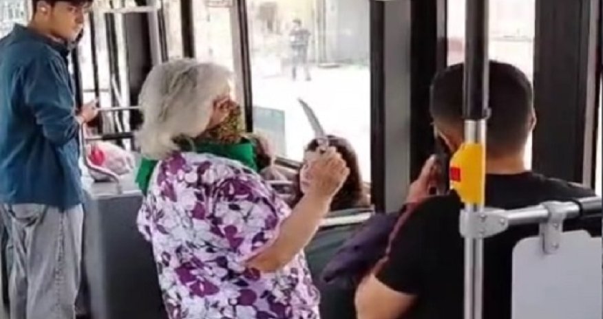 Əlibıçaqlı qadın avtobusda təşviş yaradıb- VİDEO