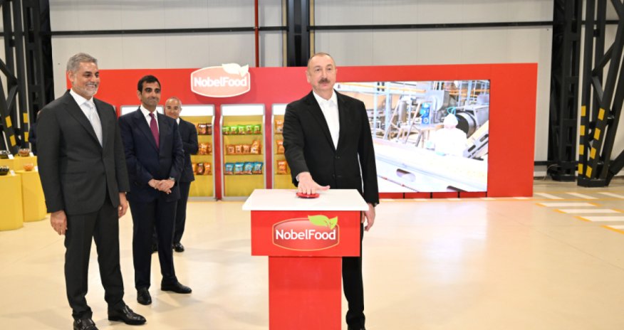 Azerbaijan's President Aliyev opens new snack food plant in Baku