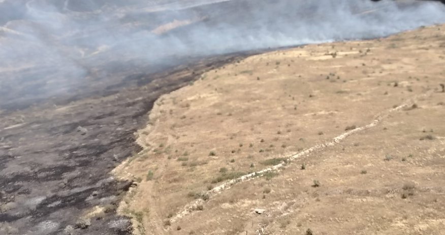 Ağdərədə açıq ərazidə yanğın: helikopter cəlb olunub