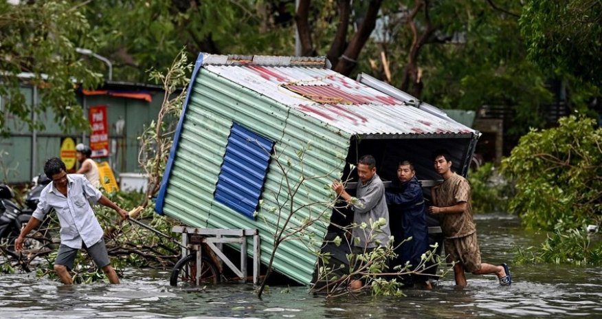 Vietnam floods leave at least 14 dead or missing