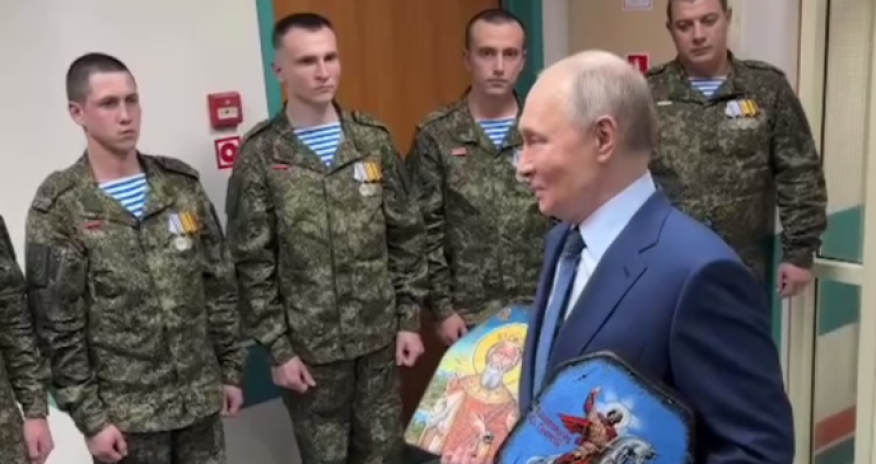 Putin visits military hospital with icons gifted by soldiers