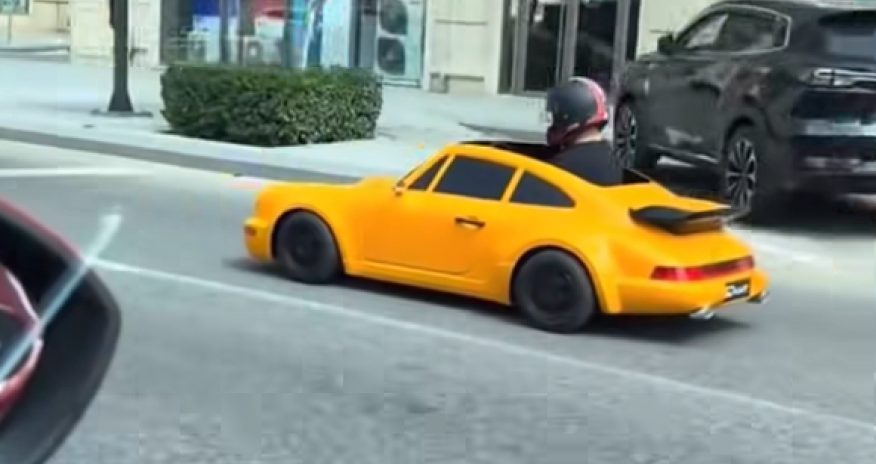 Baku driver penalized after steering toy car into busy traffic flow